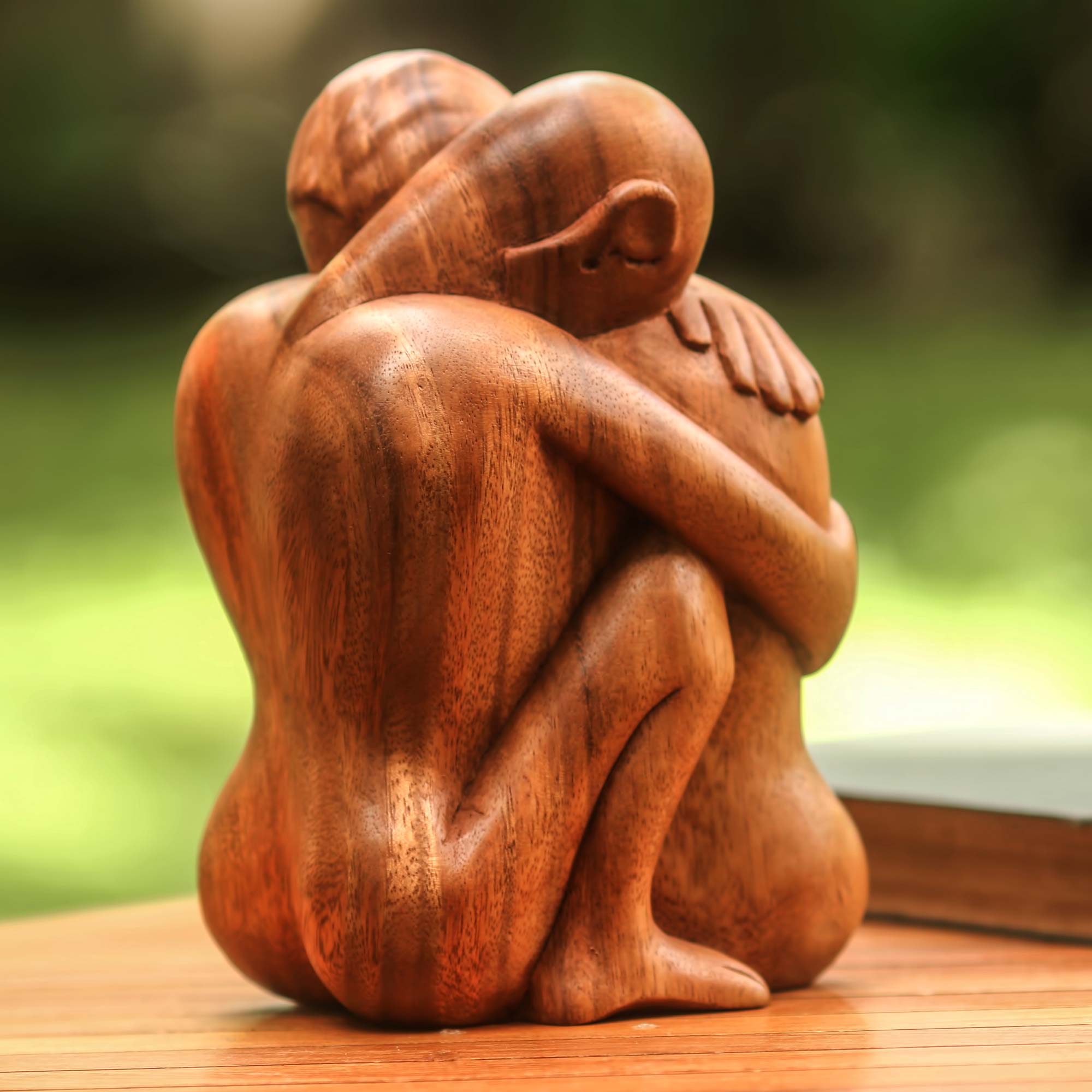 Premium Romantic Embrace Suar Wood Sculpture by Nyoman Karsa