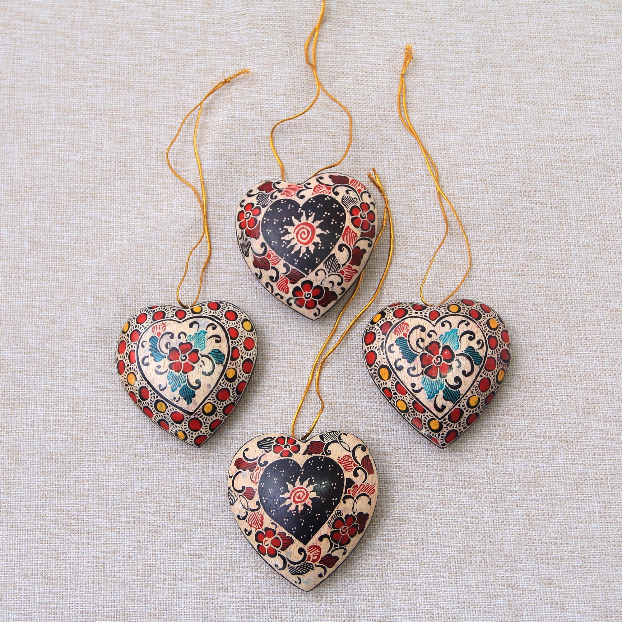 Premium Handcrafted Heart Ornaments: Floral Batik Wood Set of 4 from Java