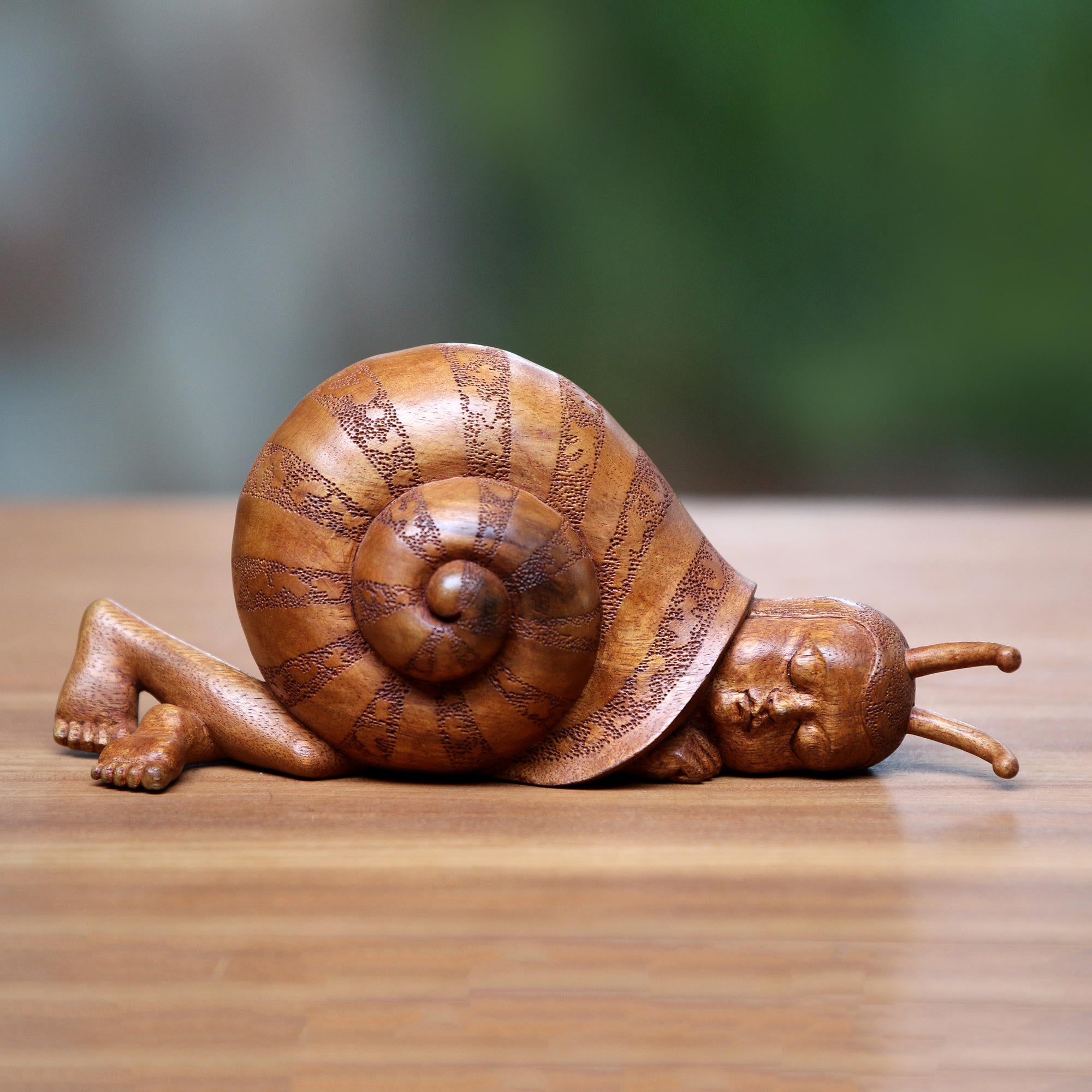 Premium Suar Wood Sculpture: Slumbering Snail Man by Indonesian Artisan