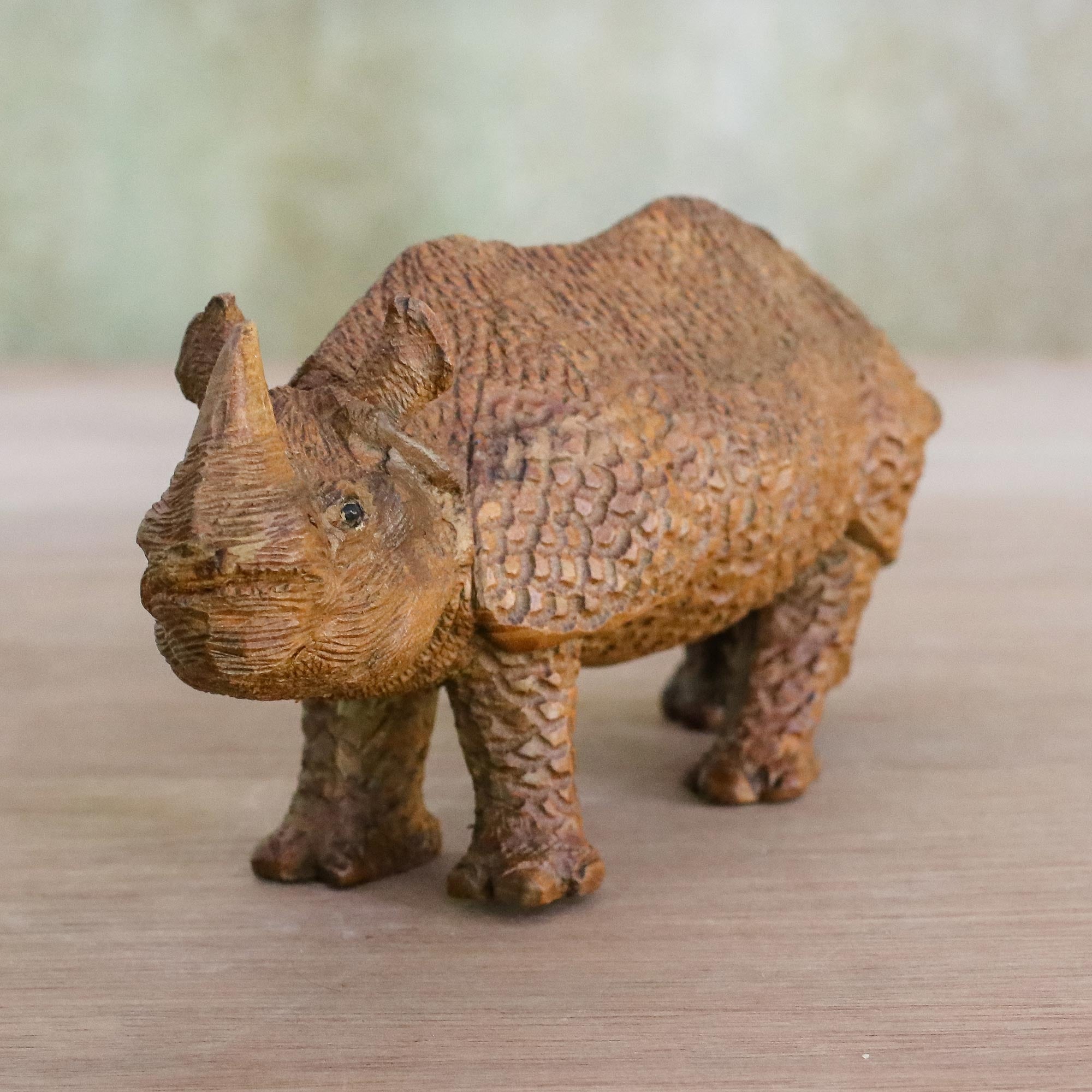 Premium Hand-Carved Raintree Wood Rhinoceros Sculpture – Curious Rhino Collection