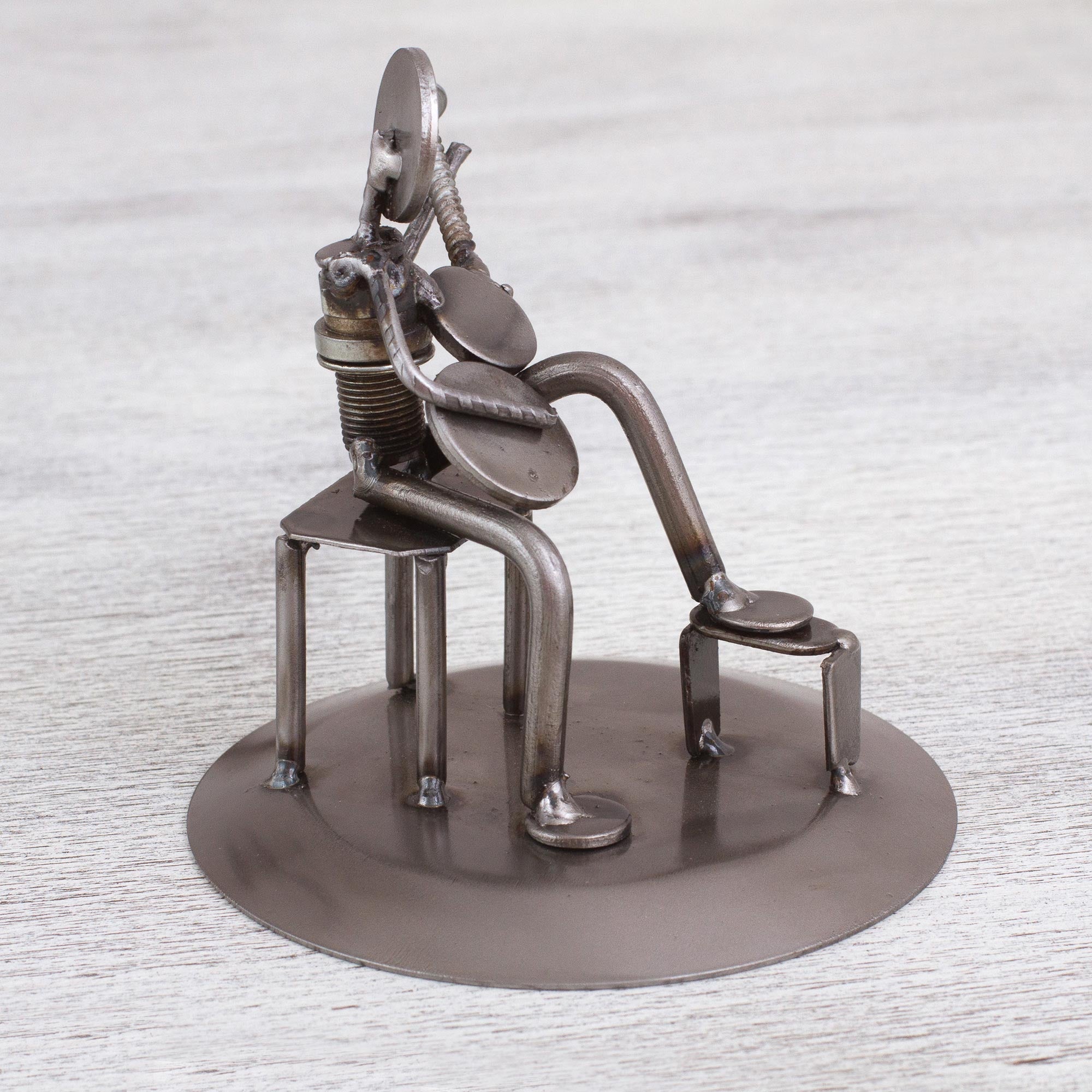 Premium Eco-Friendly Guitarist Sculpture: Rustic Auto Parts Art