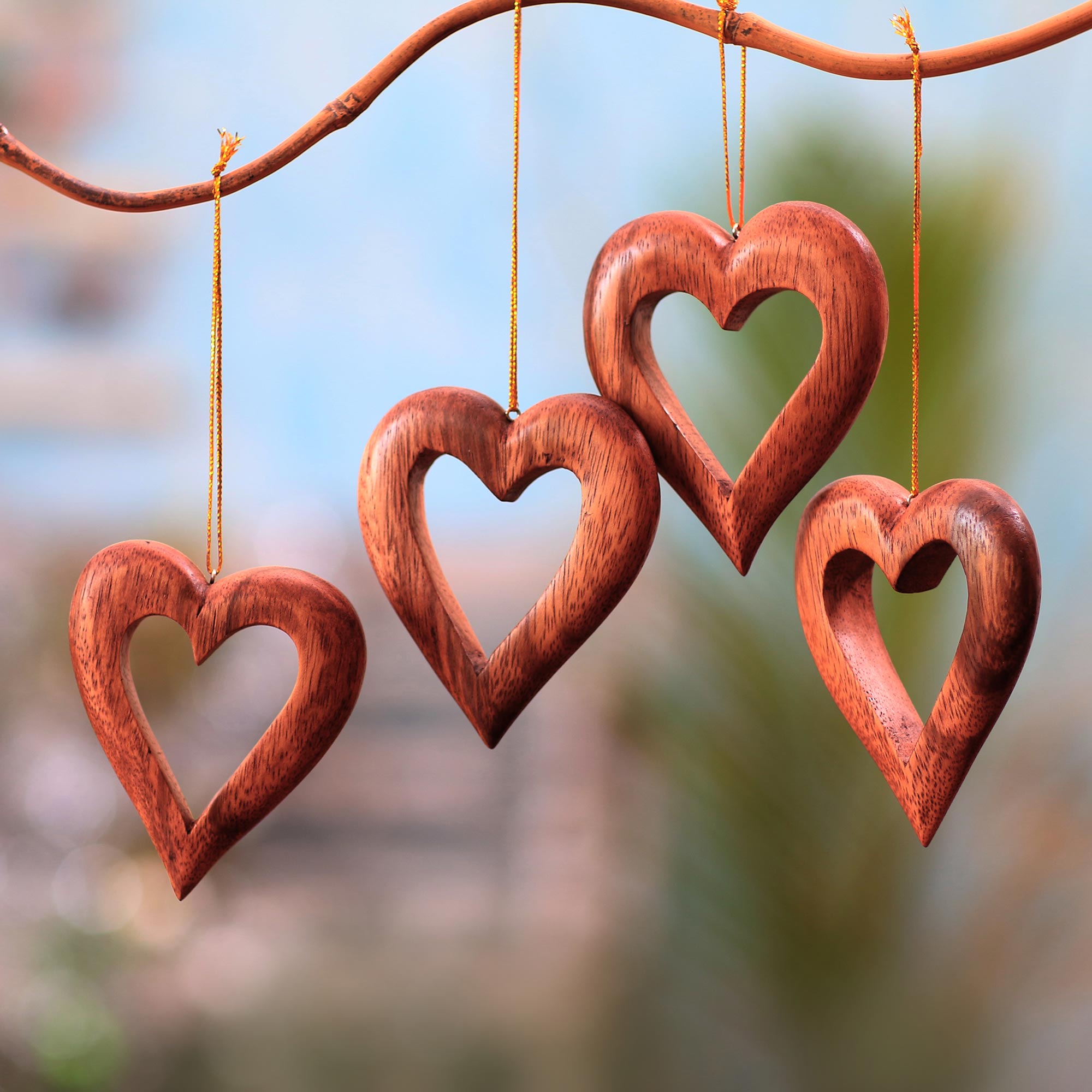 Premium Hand-Carved Heart-Shaped Suar Wood Ornaments from Bali - Set of 4