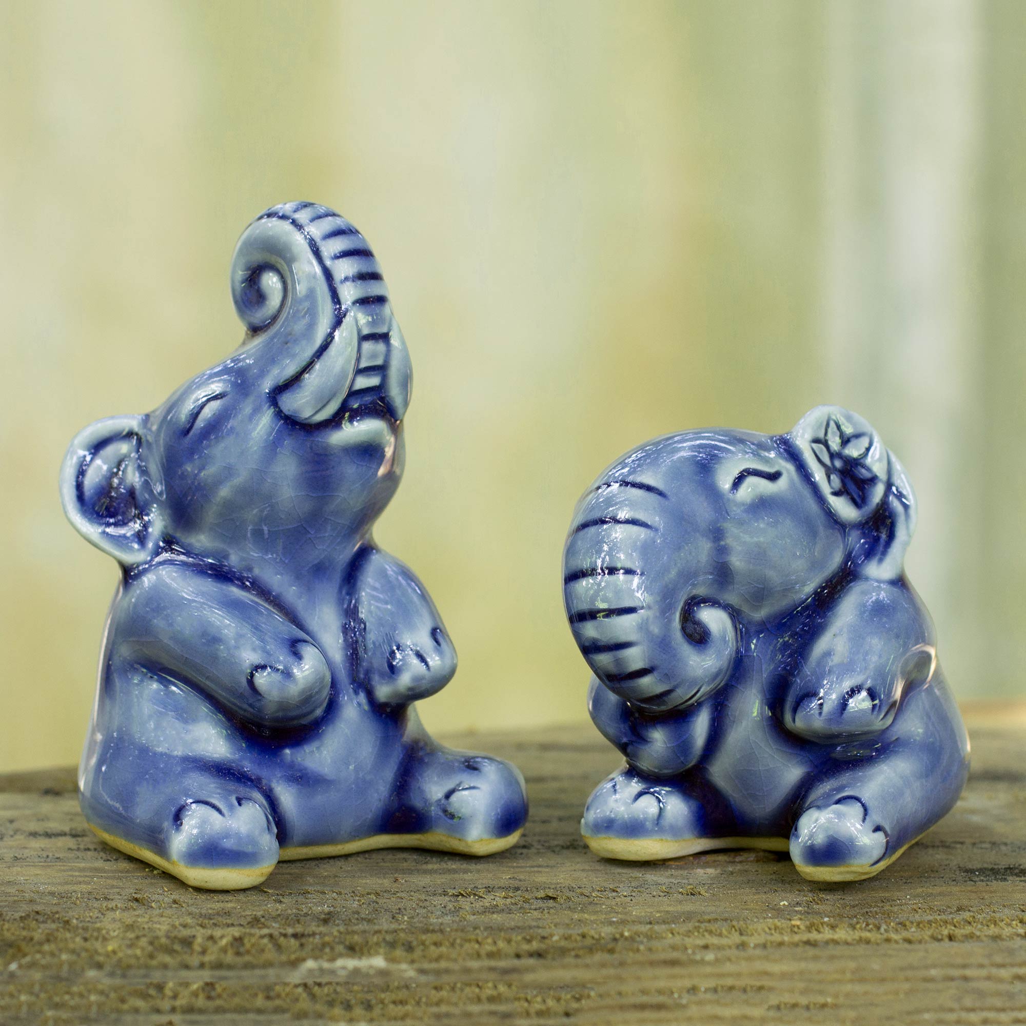 Premium Handcrafted Celadon Ceramic Elephant Sculptures - Laughing Pair
