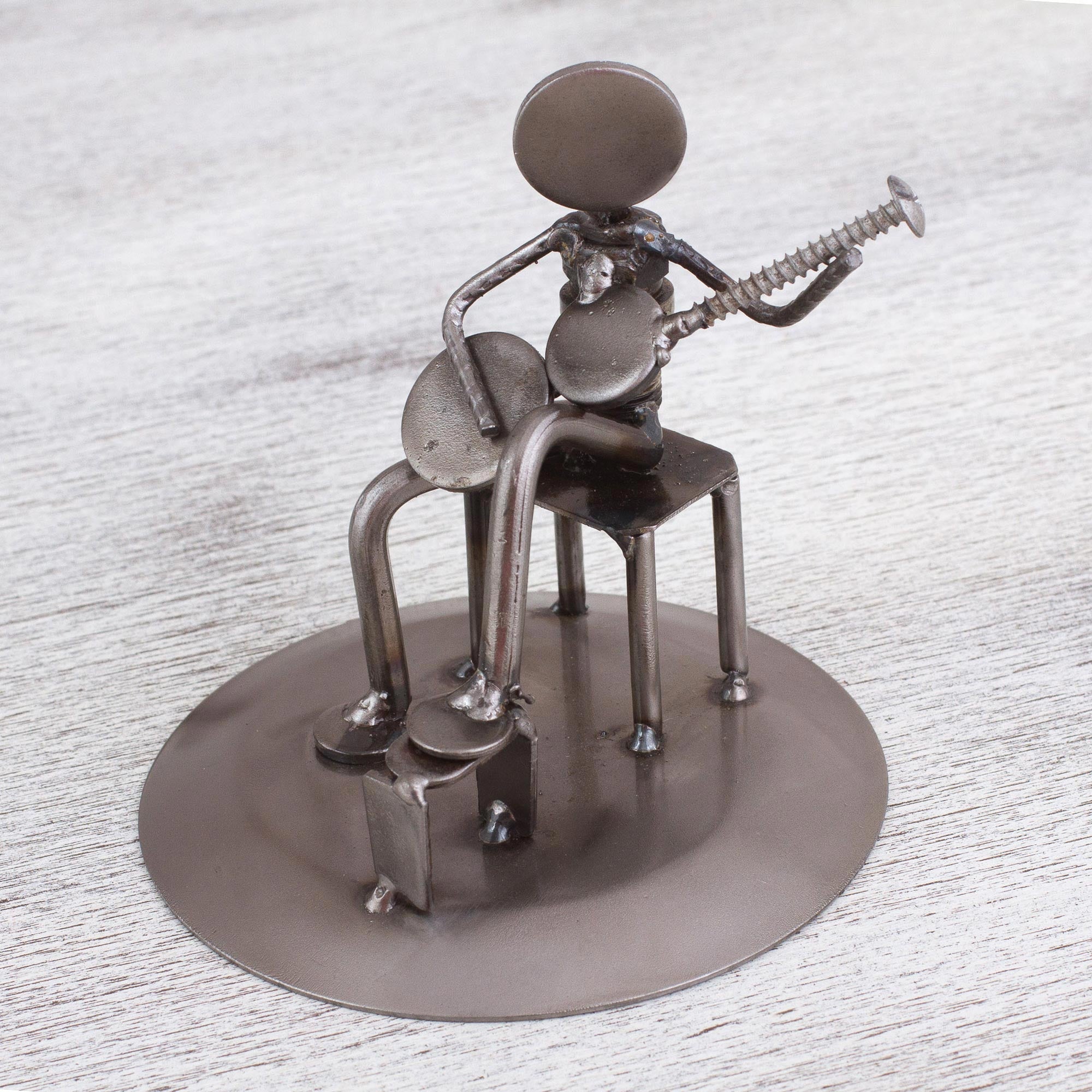 Premium Eco-Friendly Guitarist Sculpture: Rustic Auto Parts Art