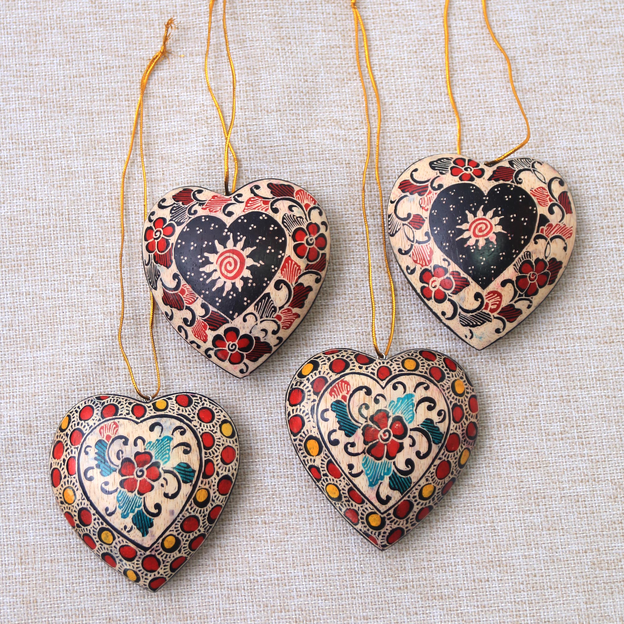 Premium Handcrafted Heart Ornaments: Floral Batik Wood Set of 4 from Java