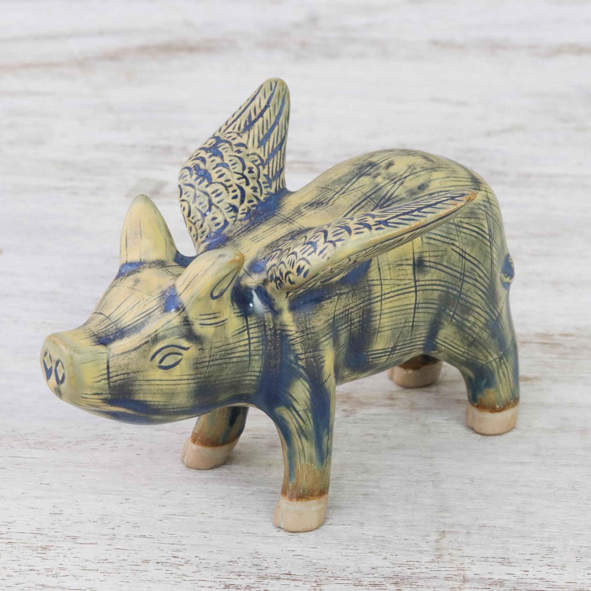 Premium Handcrafted Celadon Ceramic Flying Pig Figurine in Mustard & Blue
