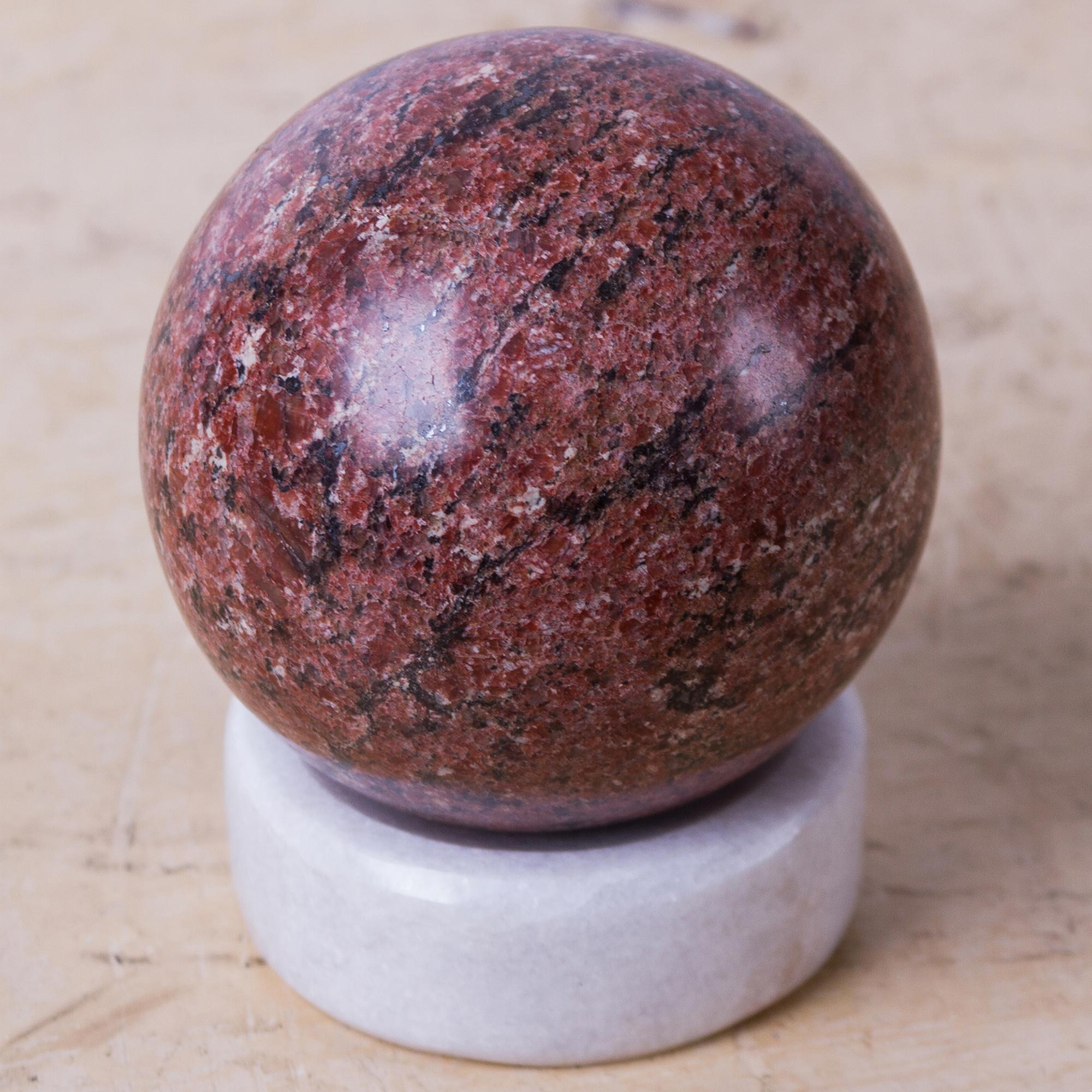 Premium Red Planet Handcrafted Rhodochrosite Sphere with Onyx Stand - Ultimate Love Stone