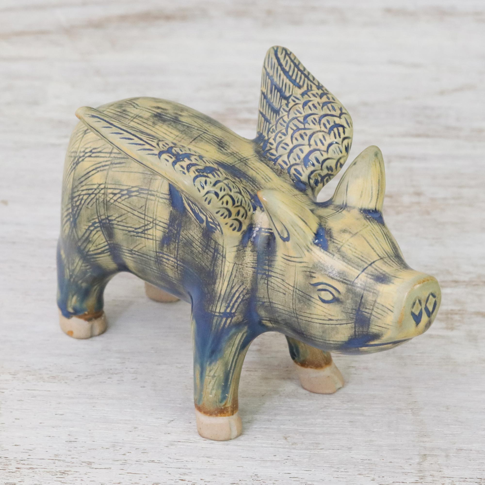 Premium Handcrafted Celadon Ceramic Flying Pig Figurine in Mustard & Blue